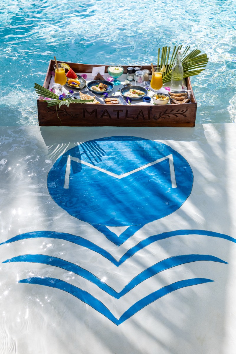 Floating breakfast tray in the Villa Kidosho pool at Boutique Hotel Matlai